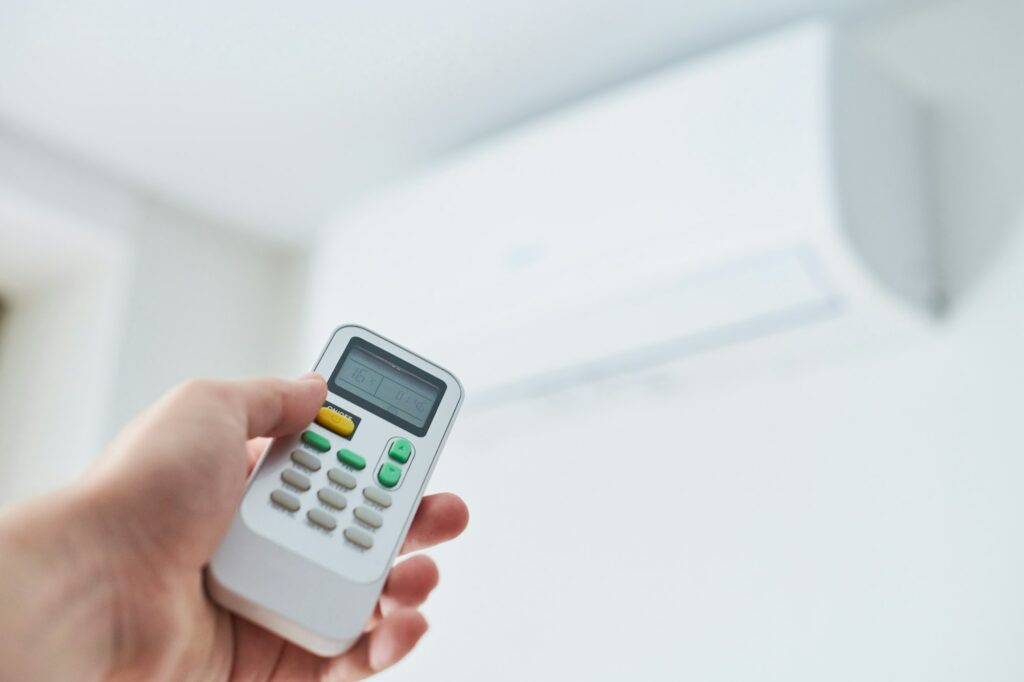 Remote control for air conditioner in hand